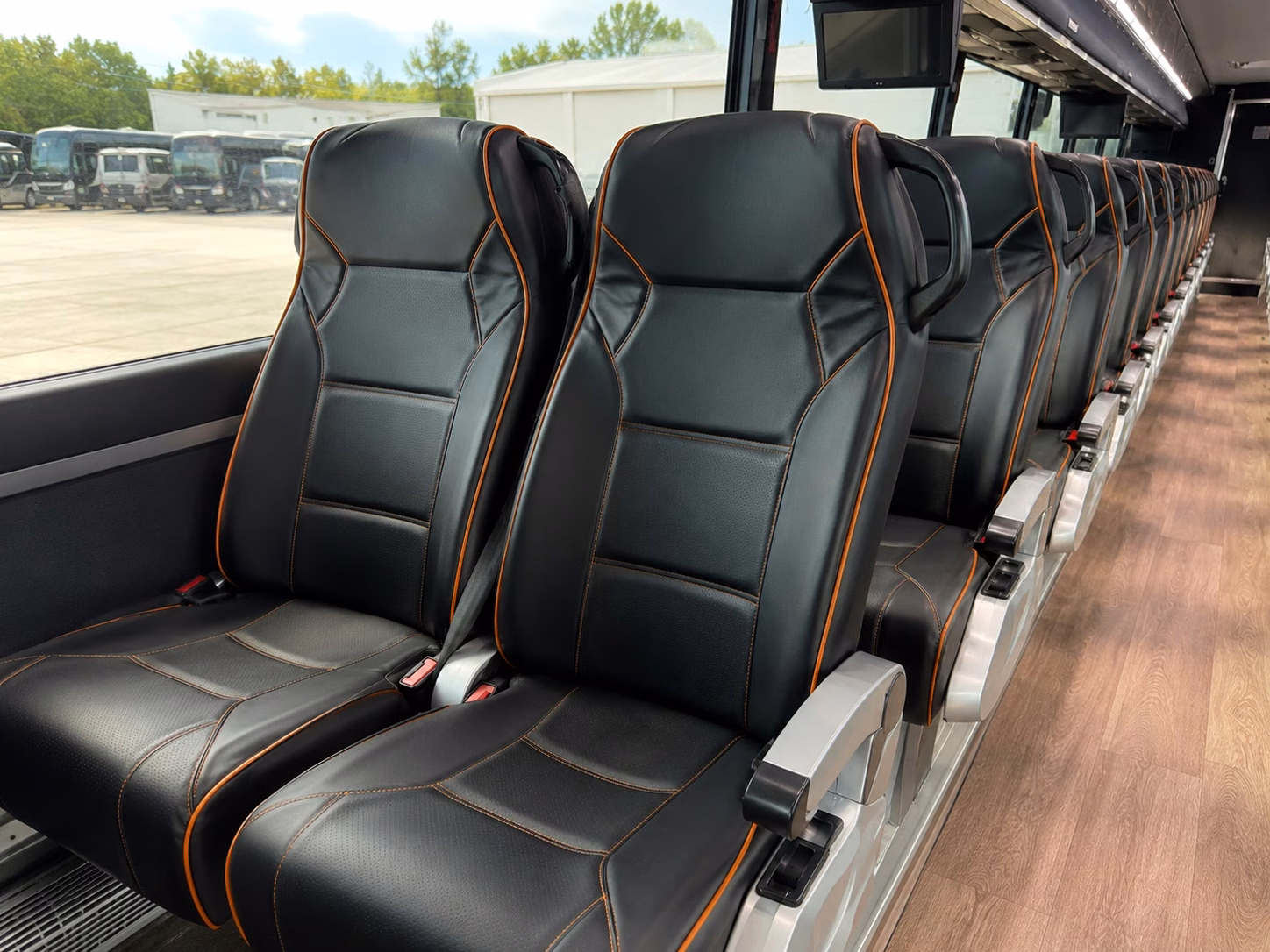 corporate sporting event shuttles for warren businesses and team outings